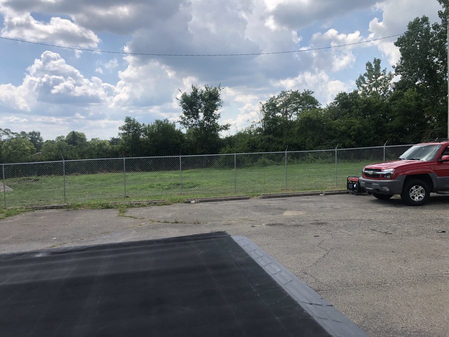 Chain-link fence commercial parking lot installed by Broadway Fence LLC