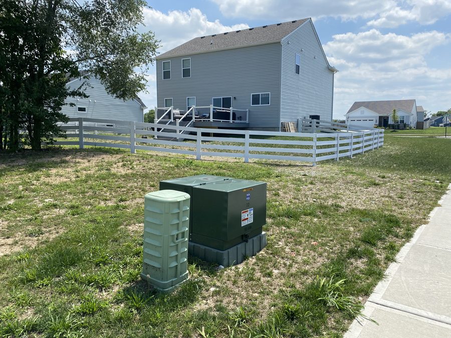 White vinyl 4-rail ranch fence by Broadway Fence LLC