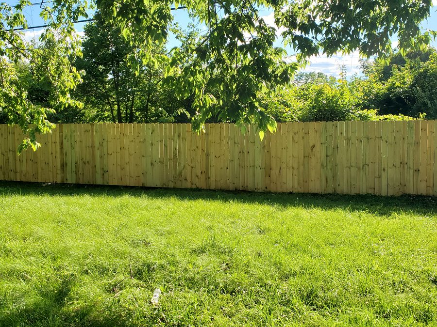 New pressure-treated pine privacy fence by Broadway Fence LLC